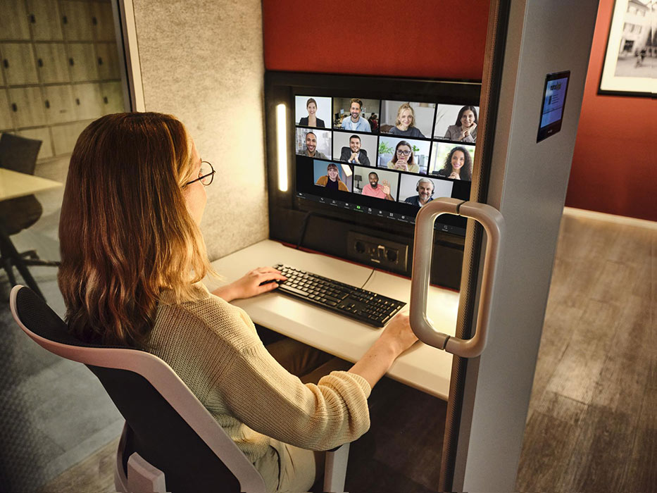 Calma pod being used for team video conferencing.