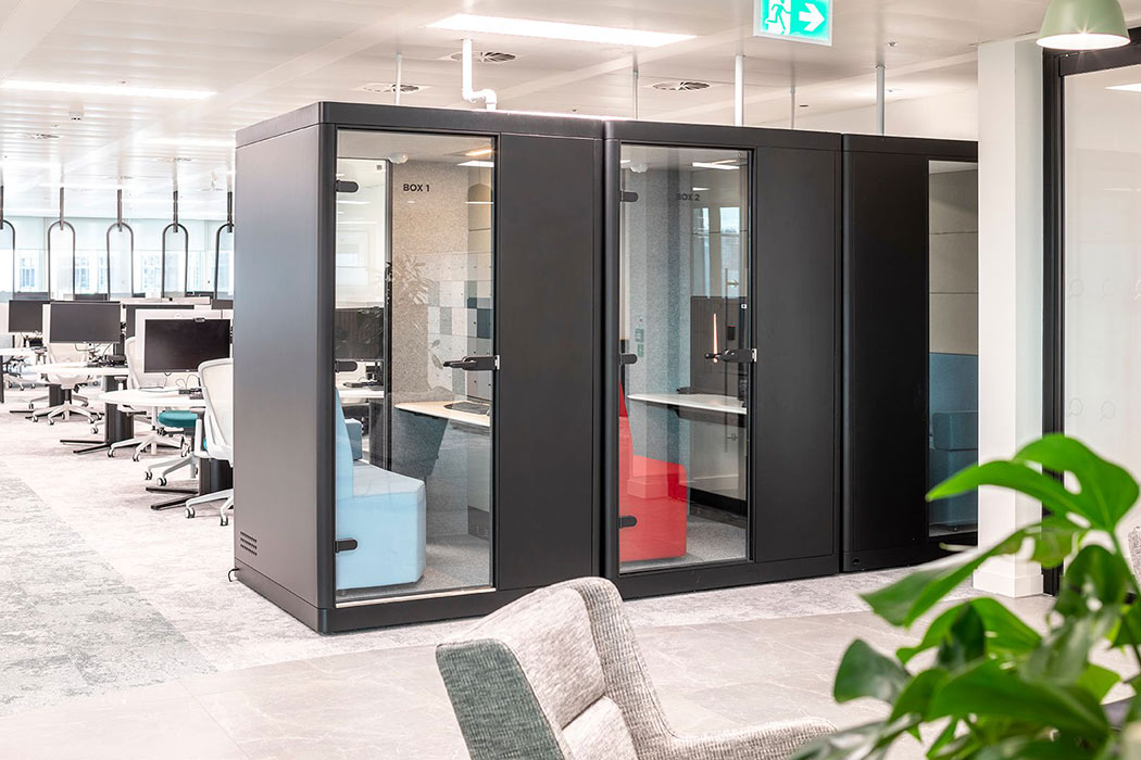 Calma Z2 pods in a row in open plan office.