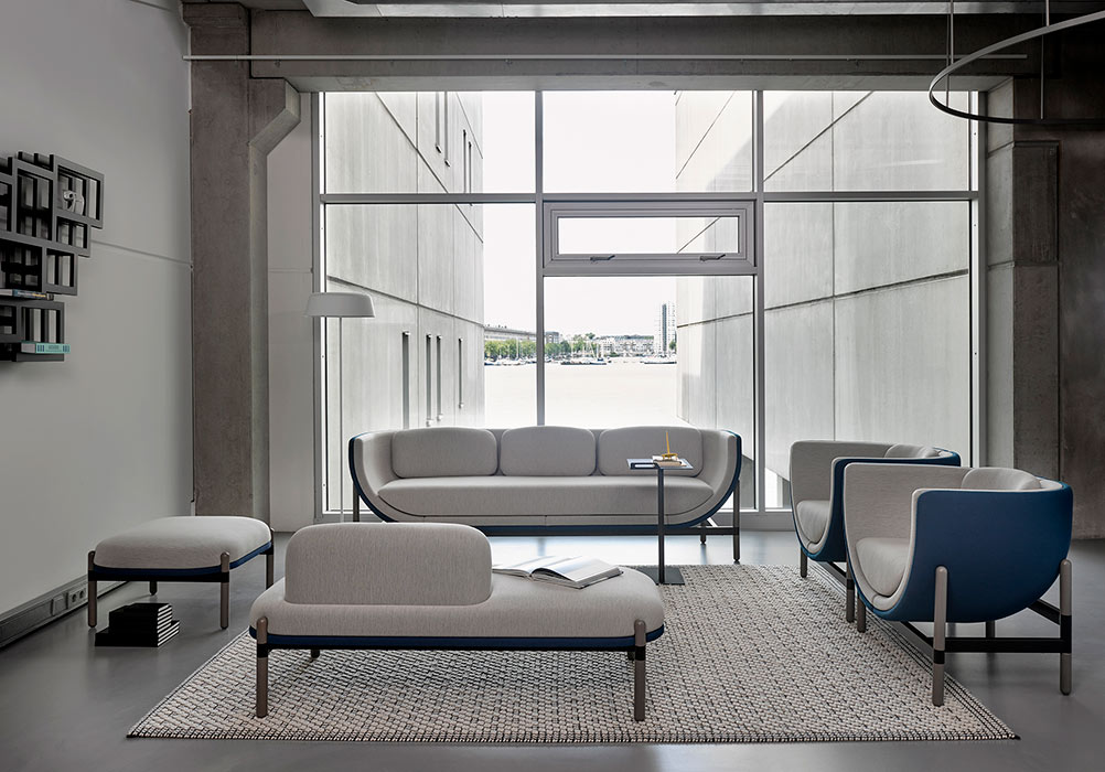 Capsule sofas and benches in waiting area