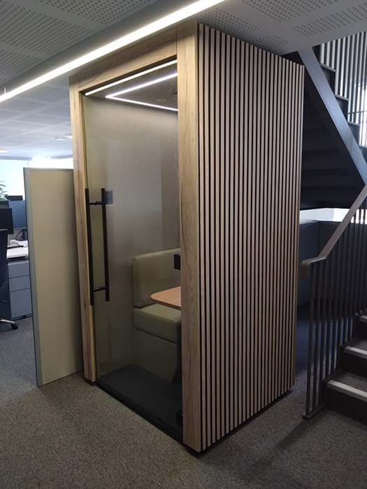 Clara wood pod under stairs.