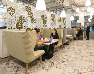 Pink sofa on wood legs