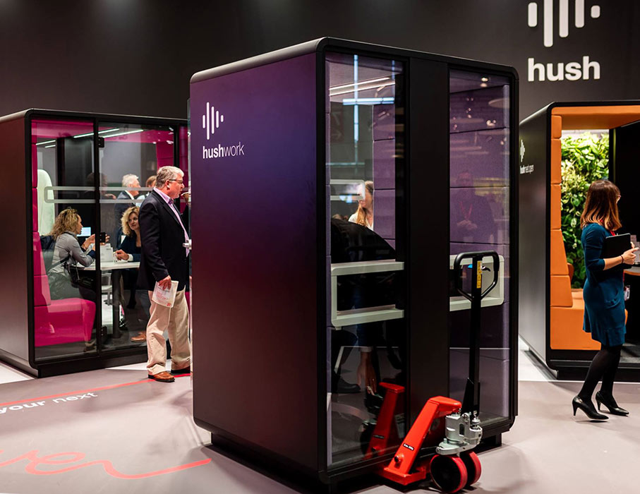 Black mobile office pod on pallet trucks.
