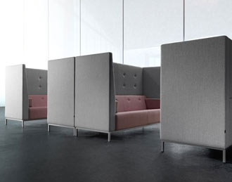 High backed acoustic sofas facing each other