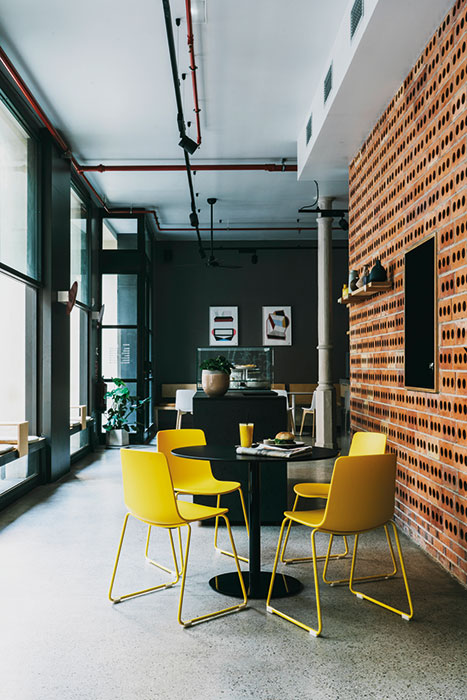 Lottus yellow sled chair