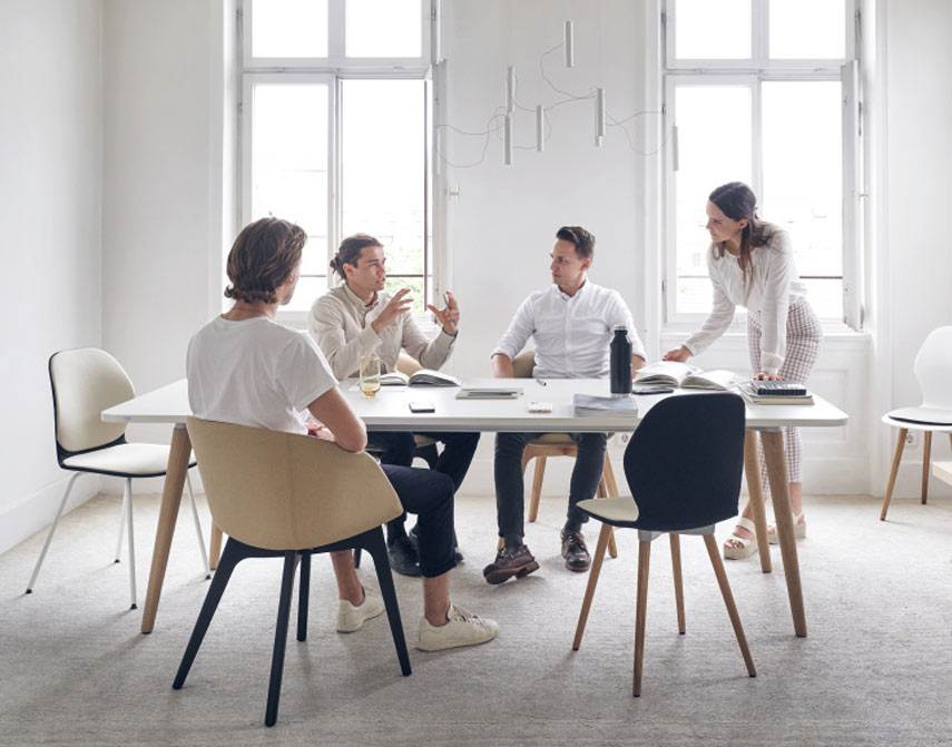 Multipurpose chairs around a meeting table
