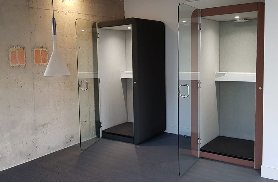 Penelope phone booths in corridor.