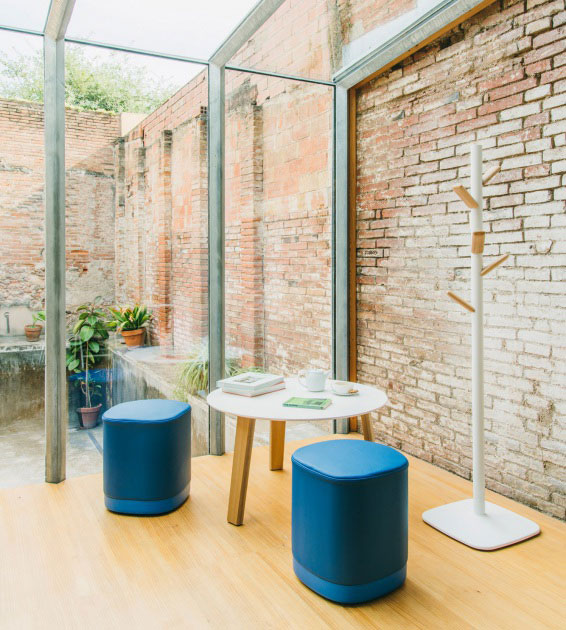 Puck stools at coffee table