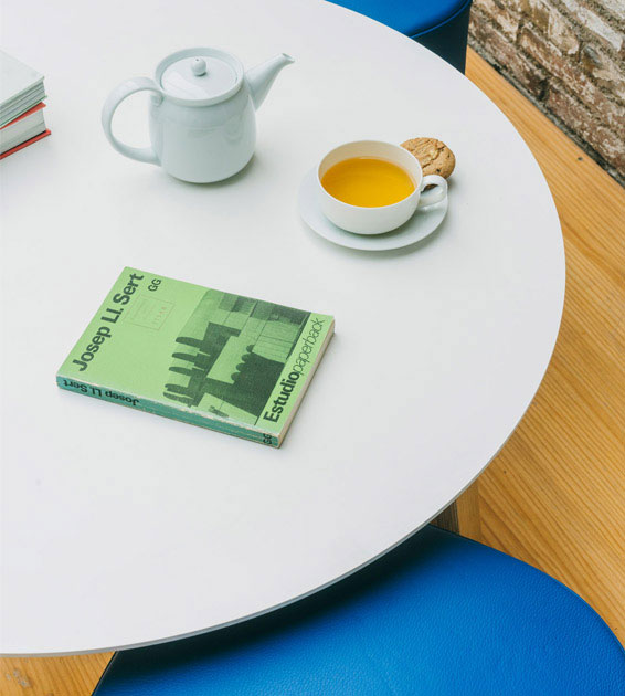 Puck stool blue upholstery 