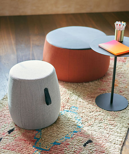 Meeting and training round stools next to a coffee table