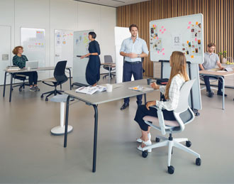 Mobile Lottus chairs at meeting table