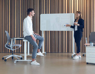 Table with writable surface which flips like a whiteboard