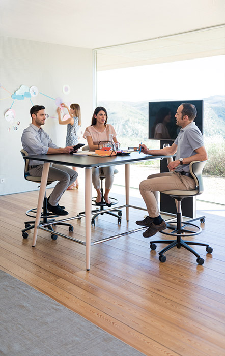 Turn around stools at high collaboration table