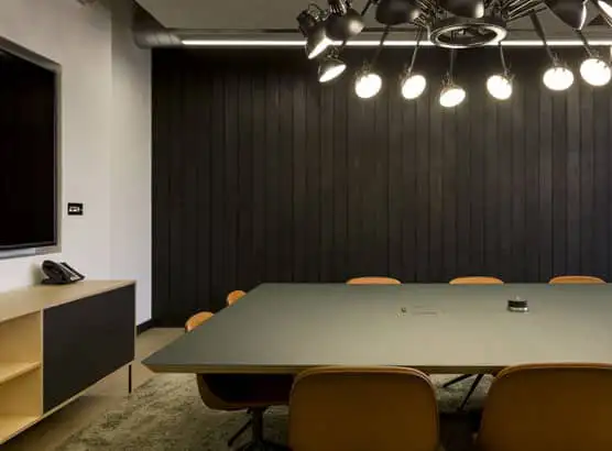 Contemporary black boardoom table with wood edging